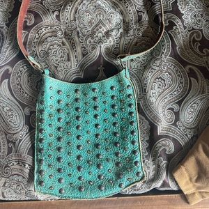 Kurtmen distressed cross body